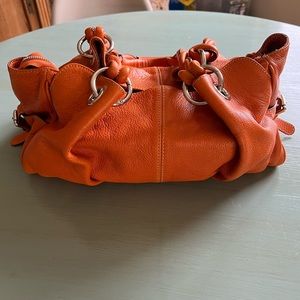 Italian leather handbag with braided leather handles
